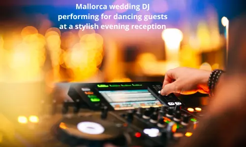 Wedding DJ in Mallorca mixing live music on a DJ deck during a beach wedding
