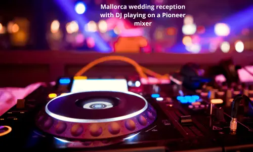 Mallorca wedding reception with DJ playing on a Pioneer mixer